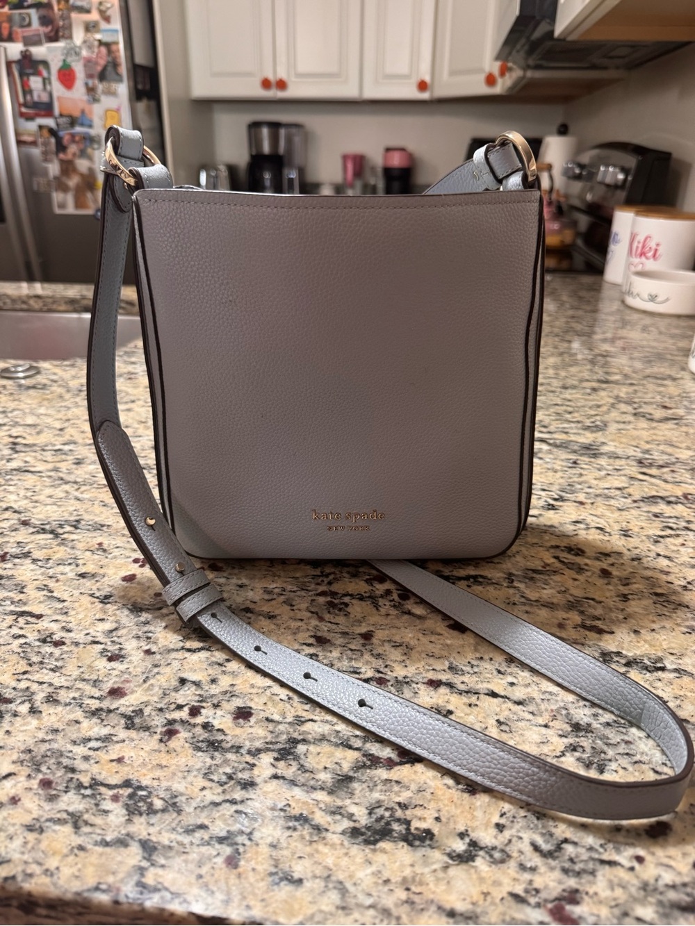 kate spade gray pebbled leather crossbody with gold hardware